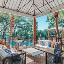 outside seating with a wooden cabana