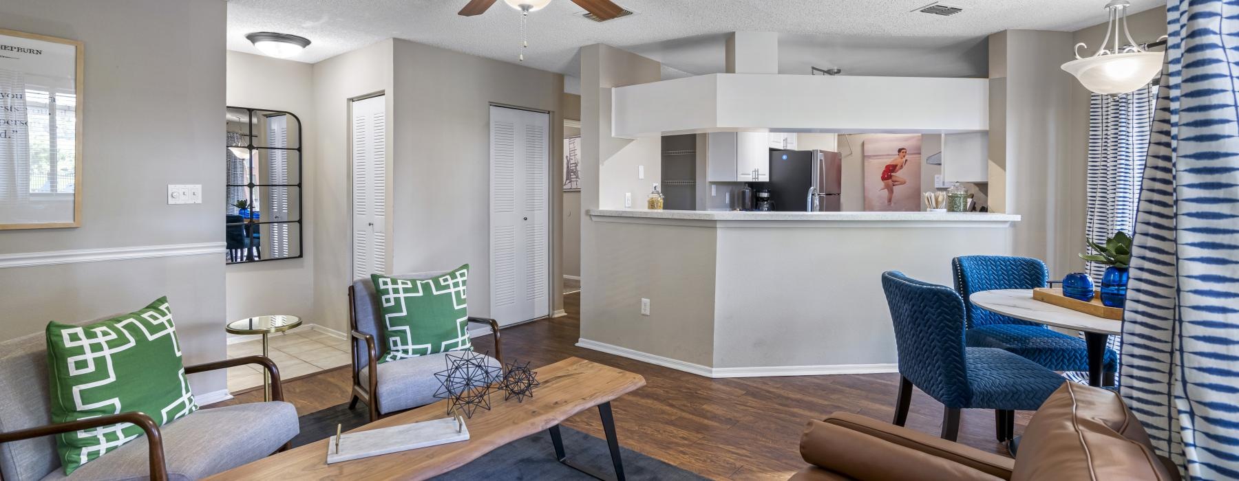 spacious modern living area with a connected kitchen