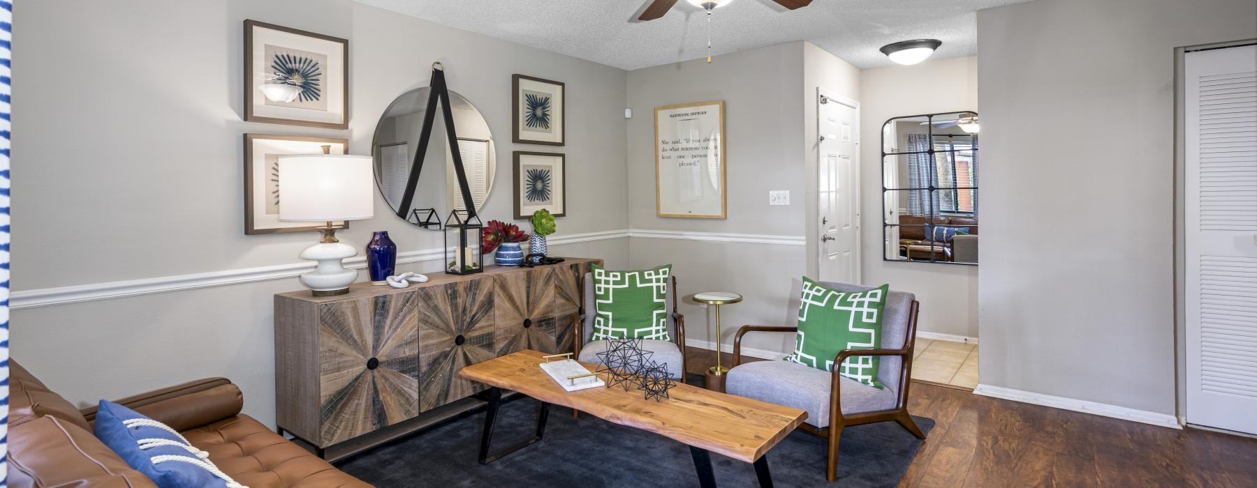 a living room with a fan